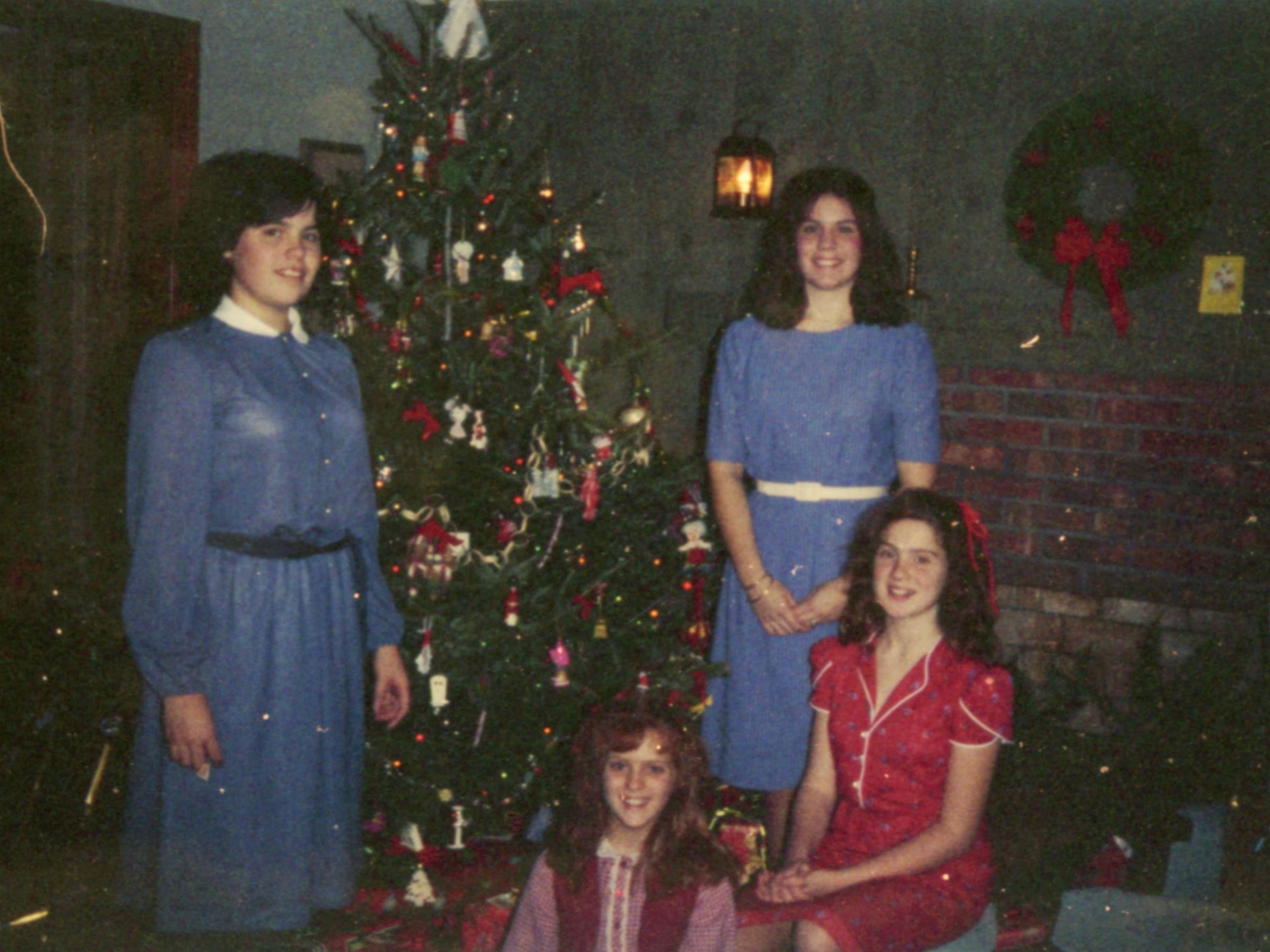 Early 1980s photo of me and my sisters at Christmas.